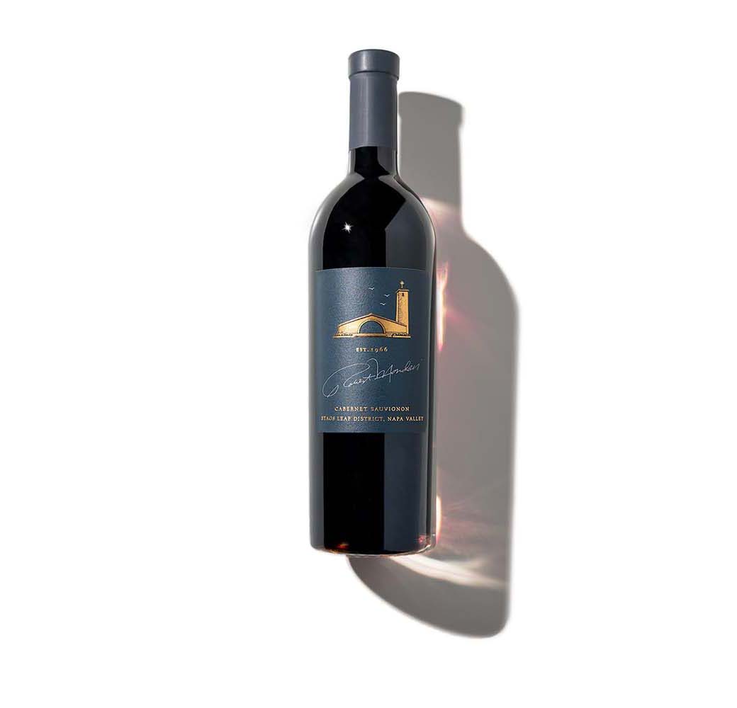 A bottle of 2018 Robert Mondavi Winery The Estates Cabernet Sauvignon Clone 685 Stags Leap District on a white background