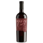 A bottle of Domaine Curry Napa Valley red wine, featuring a dark glass bottle with a black cap and a burgundy label with gold and white text.