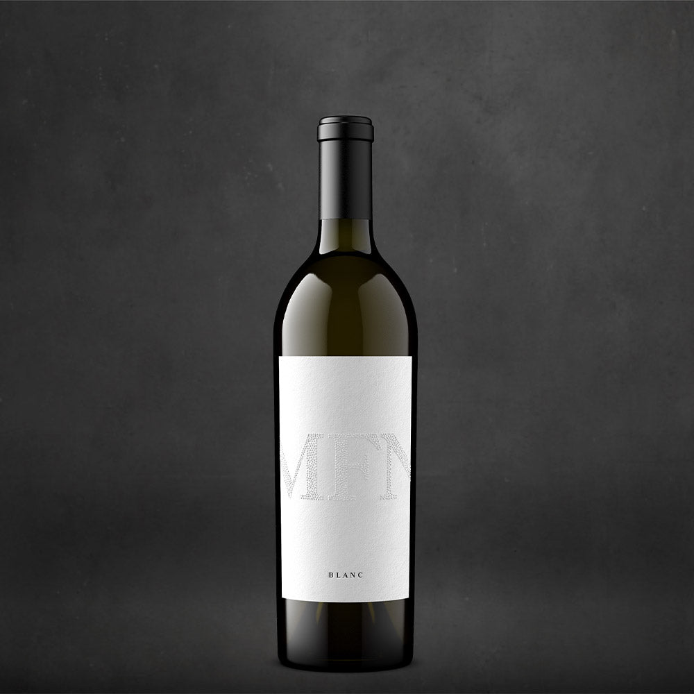 A bottle of My Favorite Neighbor Blanc on a textured gray background.