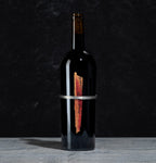 Bottle of The Prisoner Sliver Red Blend on a black background