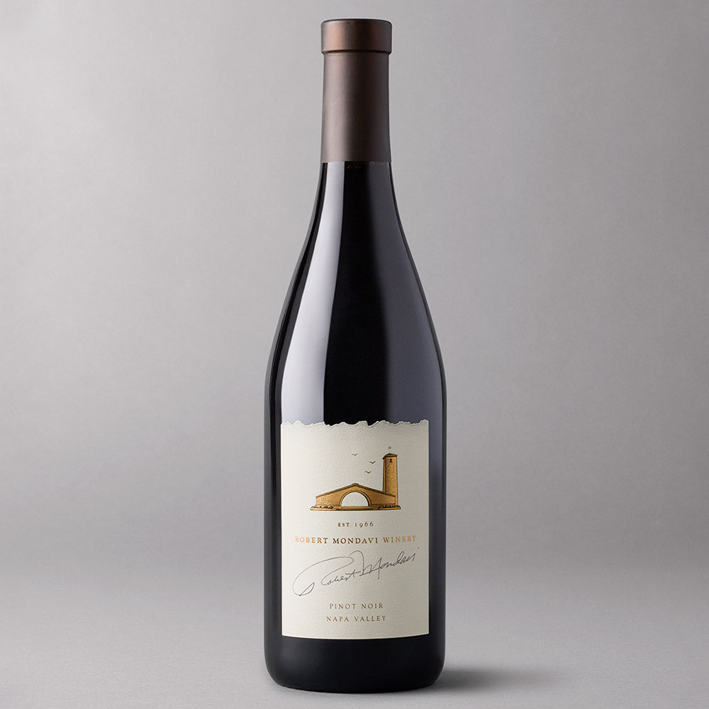 Bottle of Robert Mondavi Napa Valley Pinot Noir on a light grey background