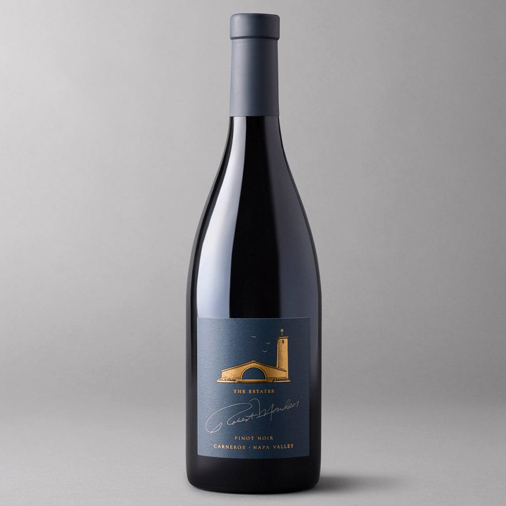 Bottle of Robert Mondavi Winery The Estates Pinot Noir Carneros on a gray background.