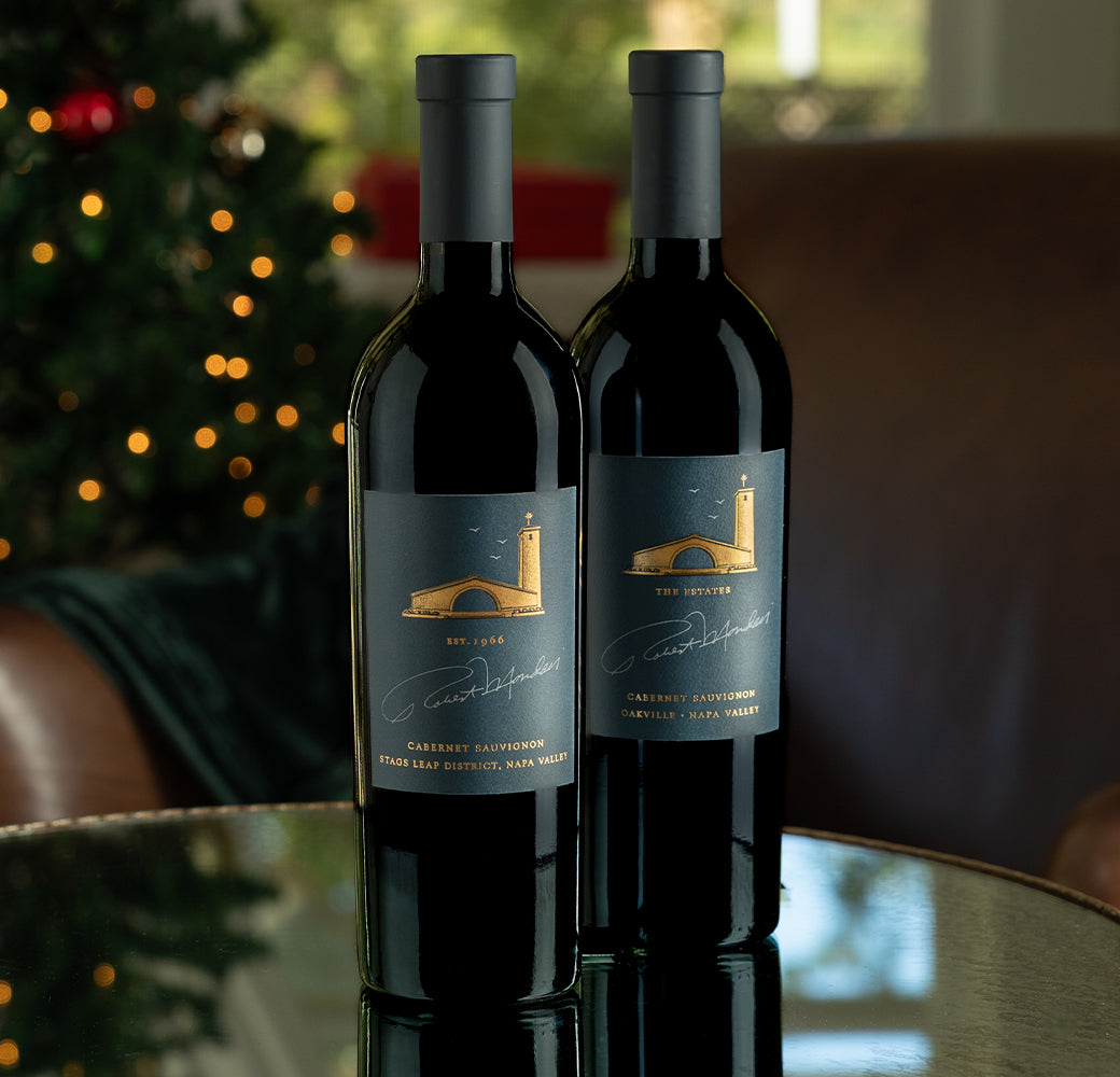 A bottle of Robert Mondavi Winery The Estates Cabernet Bundle on a white background