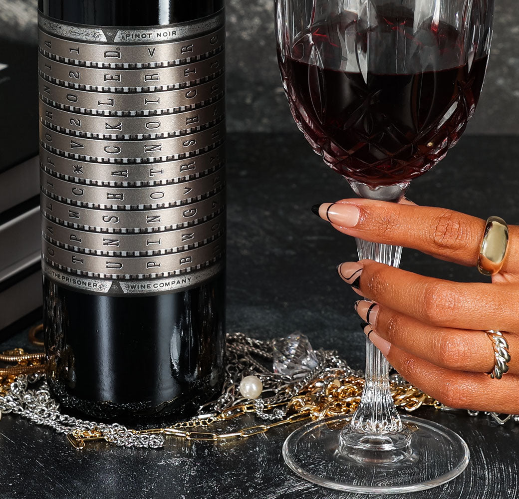 A bottle of 2021 Unshackled Pinot Noir California on a white background